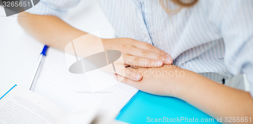 Image of student girl studying at school