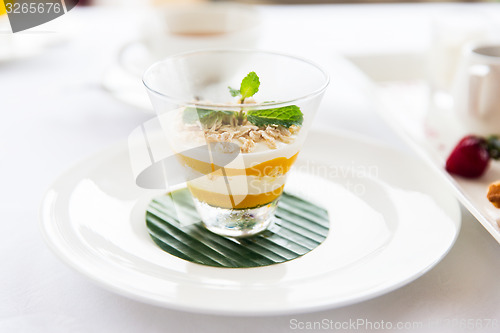 Image of close up of dessert in glass at restaurant