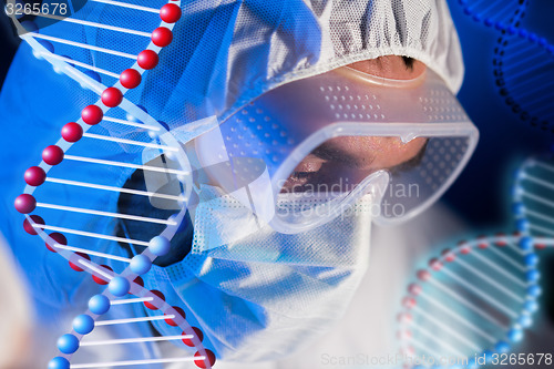 Image of close up of scientist face in chemical lab