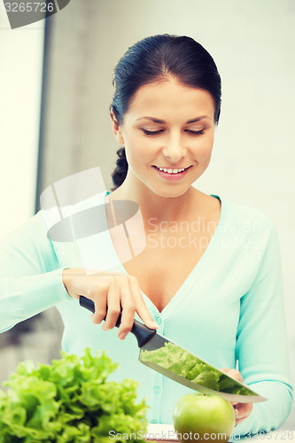Image of beautiful woman in the kitchen
