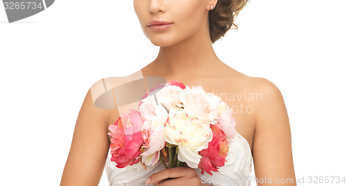 Image of woman with bouquet of flowers