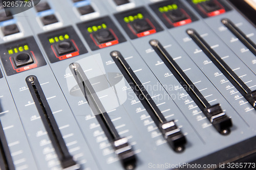 Image of control panel at recording studio or radio station