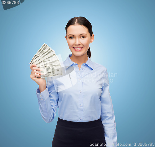 Image of businesswoman with dollar cash money