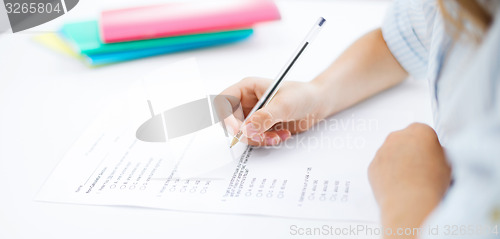 Image of little girl taking test