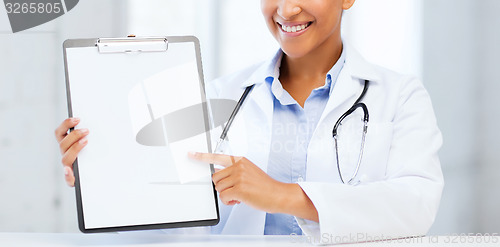 Image of doctor with blank prescription