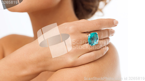 Image of beautiful woman with cocktail ring