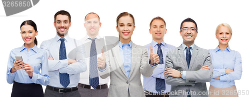 Image of group of happy businesspeople showing thumbs up