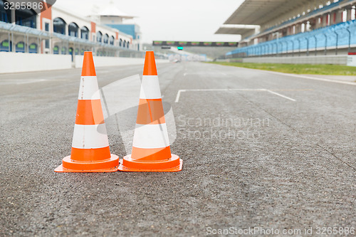 Image of traffic cones on speedway of stadium