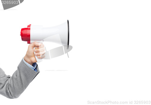 Image of businessman in suit speaking to megaphone