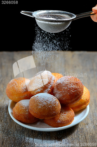 Image of Donuts with powdered sugar