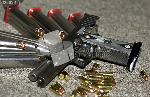 Image of handgun and ammunition