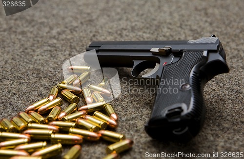 Image of pistol and bullets