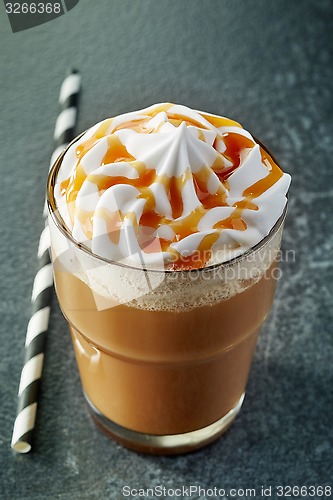 Image of glass of caramel latte coffee