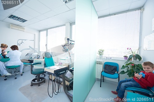 Image of woman patient at the dentist