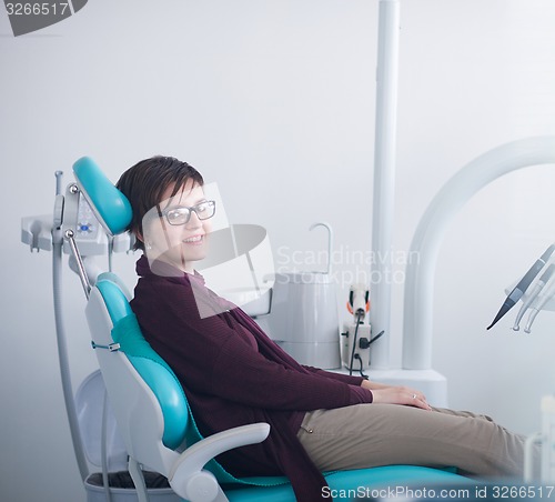 Image of woman patient at the dentist