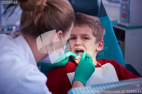 Image of Young boy in a dental surgery