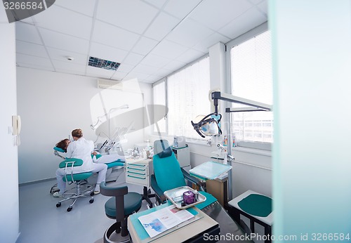 Image of woman patient at the dentist