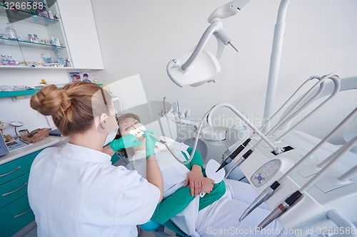 Image of woman patient at the dentist