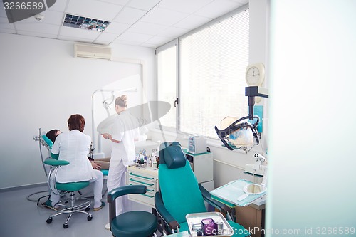 Image of woman patient at the dentist