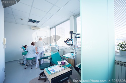 Image of woman patient at the dentist