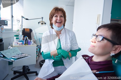 Image of woman patient at the dentist