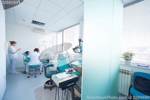 Image of woman patient at the dentist