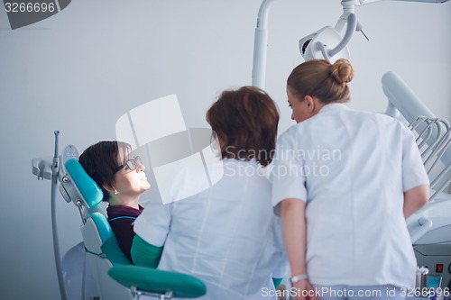 Image of woman patient at the dentist