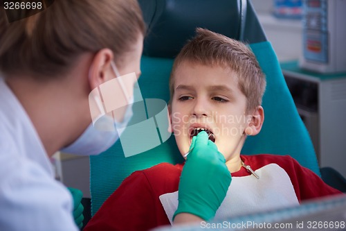 Image of Young boy in a dental surgery