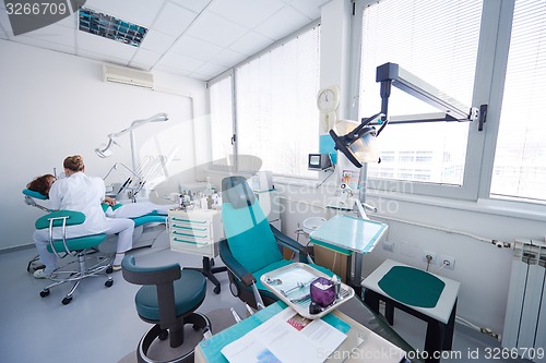 Image of woman patient at the dentist