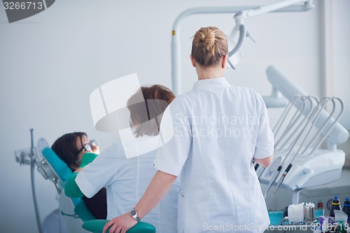 Image of woman patient at the dentist