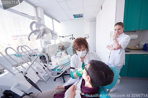 Image of woman patient at the dentist