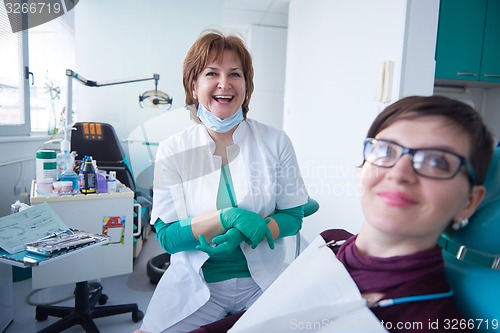 Image of woman patient at the dentist