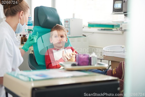 Image of Young boy in a dental surgery