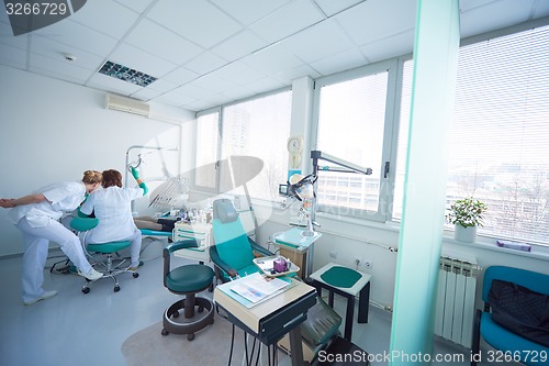 Image of woman patient at the dentist