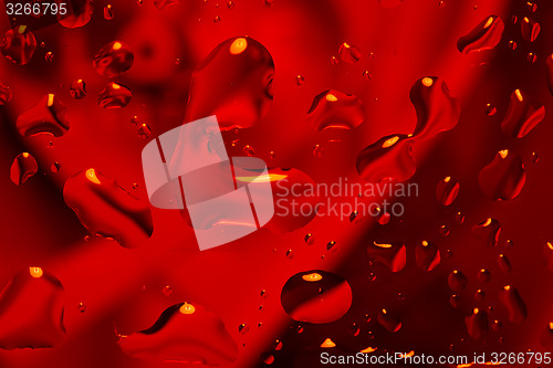 Image of red abstract background with water drops