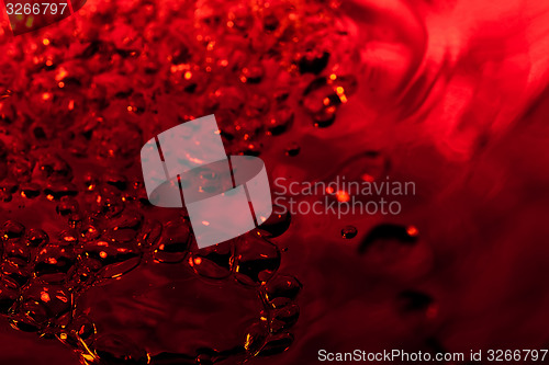 Image of red abstract background with water drops