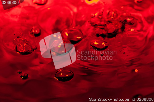 Image of red abstract background with water drops