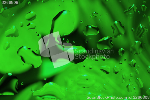 Image of green abstract background with water drops