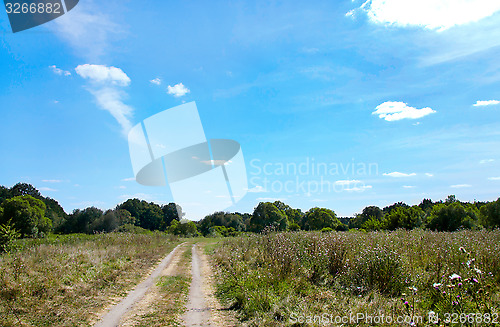Image of Landscape with dirt road in the countryside