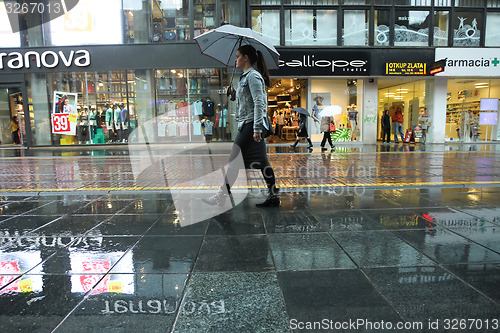 Image of Woman in the rain