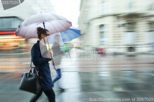 Image of Woman and man in the rain