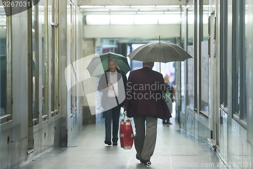 Image of Senior adults walking in passage