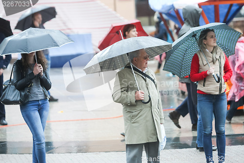 Image of Group of people on the tram station