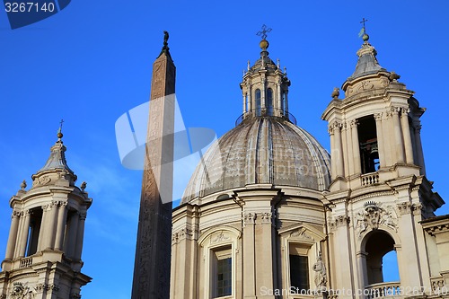 Image of Saint Agnese in Agone with Egypts obelisk in Piazza Navona, Rome