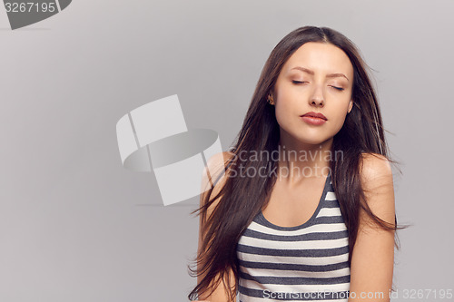 Image of Young woman enjoying