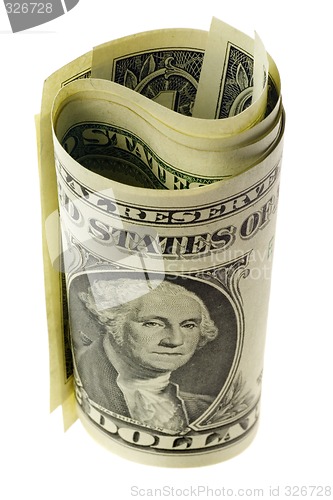 Image of US currency rolled

