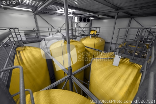 Image of Industrial interior with welded silos