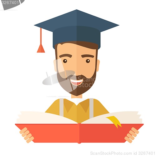 Image of Man standing with graduation cap.