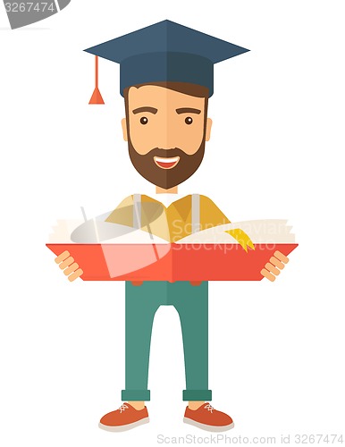 Image of Man standing with graduation cap.