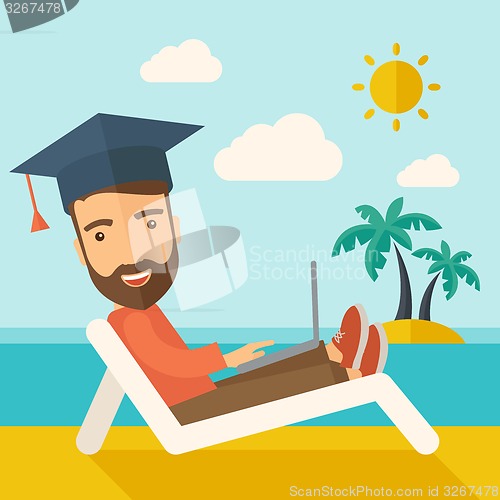 Image of Man with laptop on the beach 